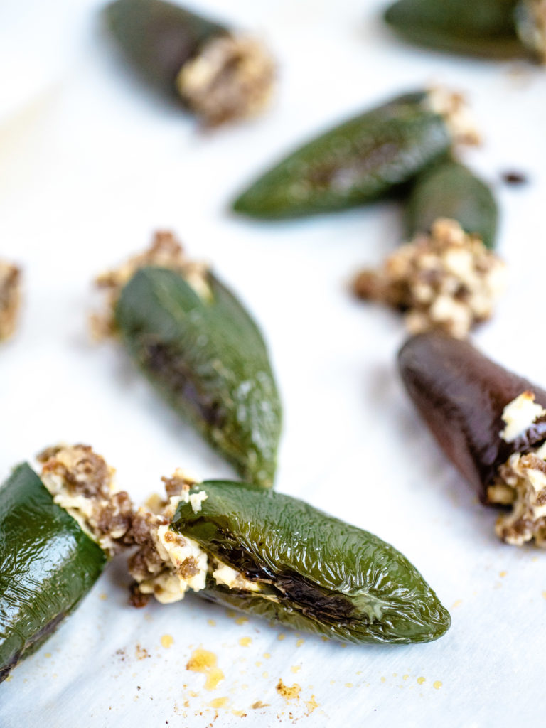 up close shot of jalapeno with sausage and cheese stuffing