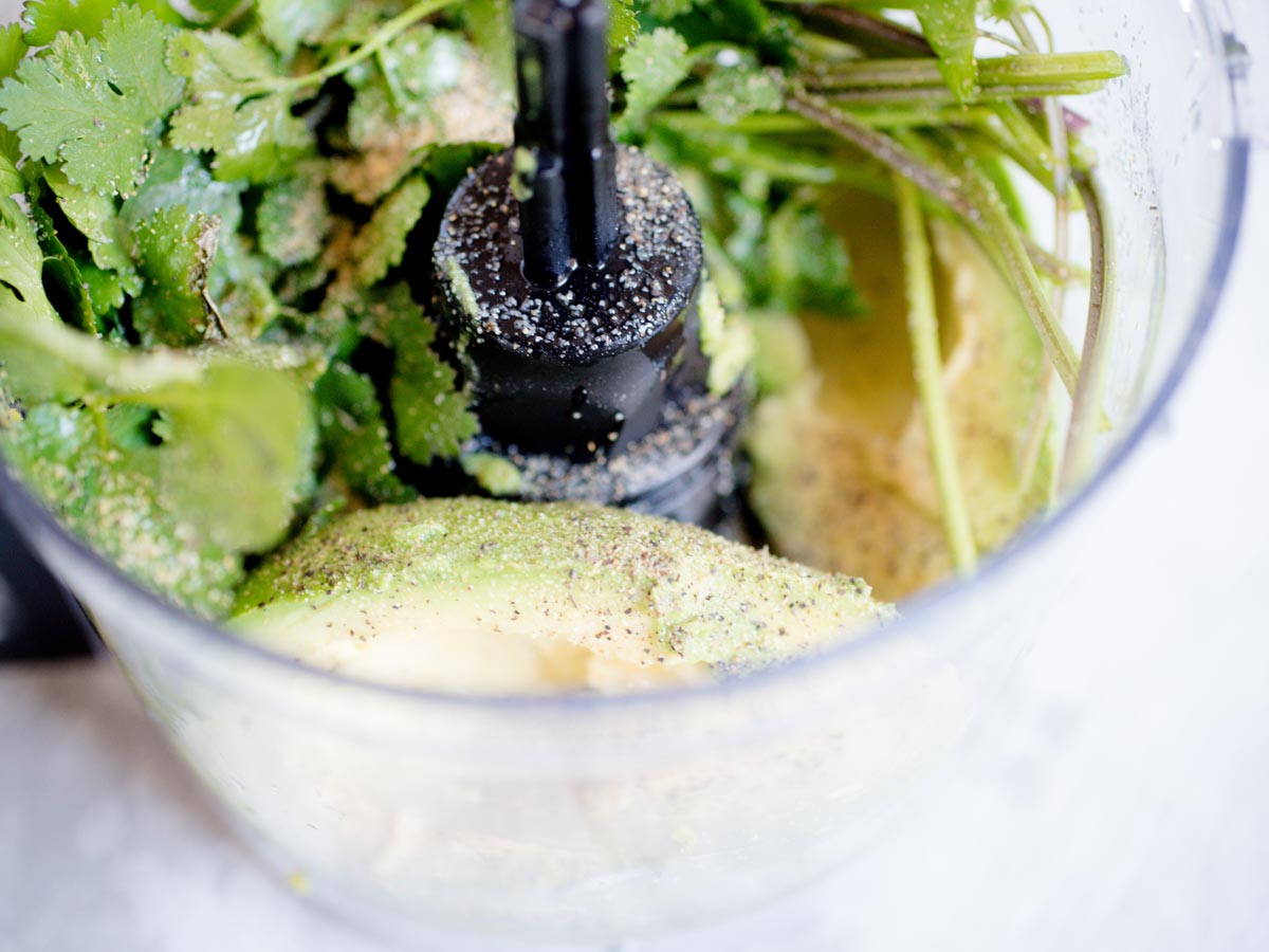 avocado and cilantro in food processor