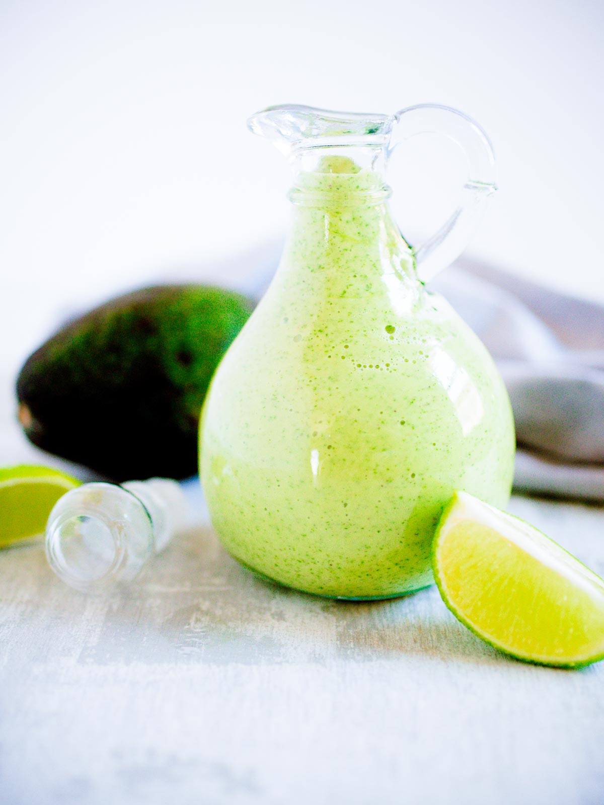 avocado cilantro dressing in a glass jar