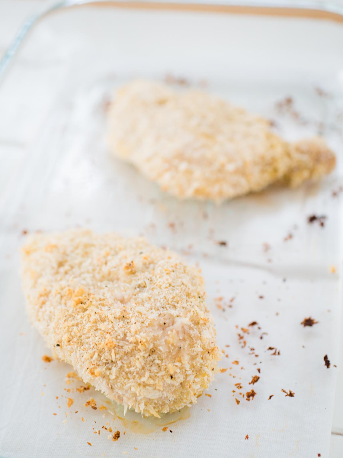 breaded baked chicken in a dish