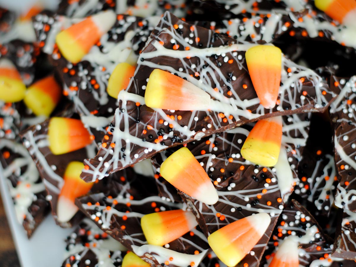 candy corn bark on a white plate