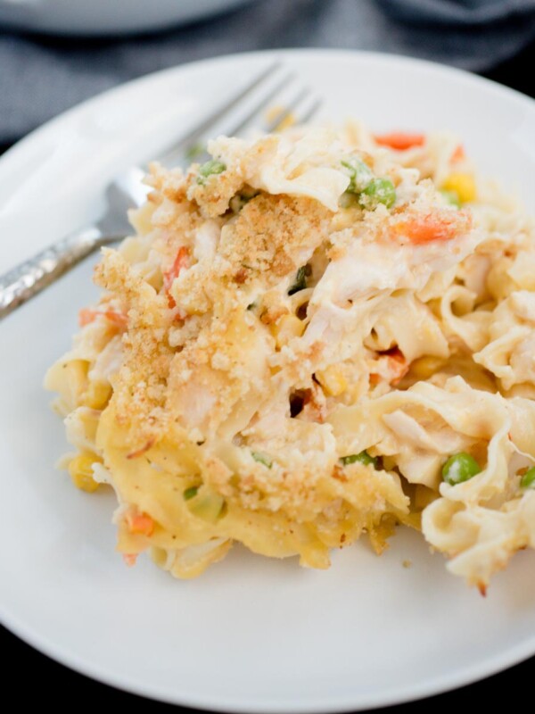chicken noodle casserole serving on a white plate