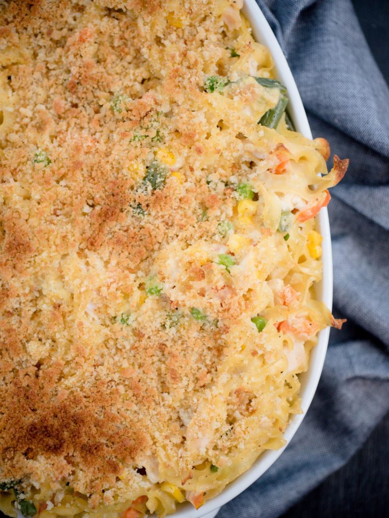 chicken noodle casserole in white baking dish