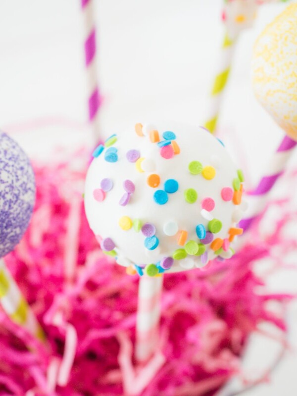 cake pops in decorative pink grass