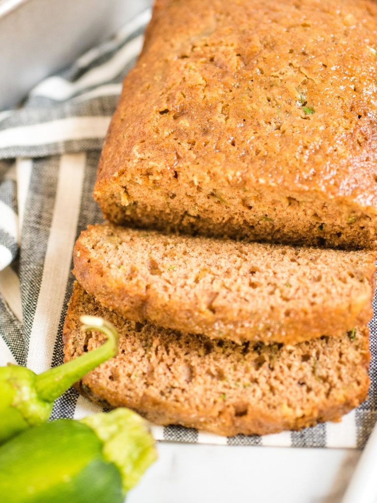 up close view of sliced green chile zucchini bread