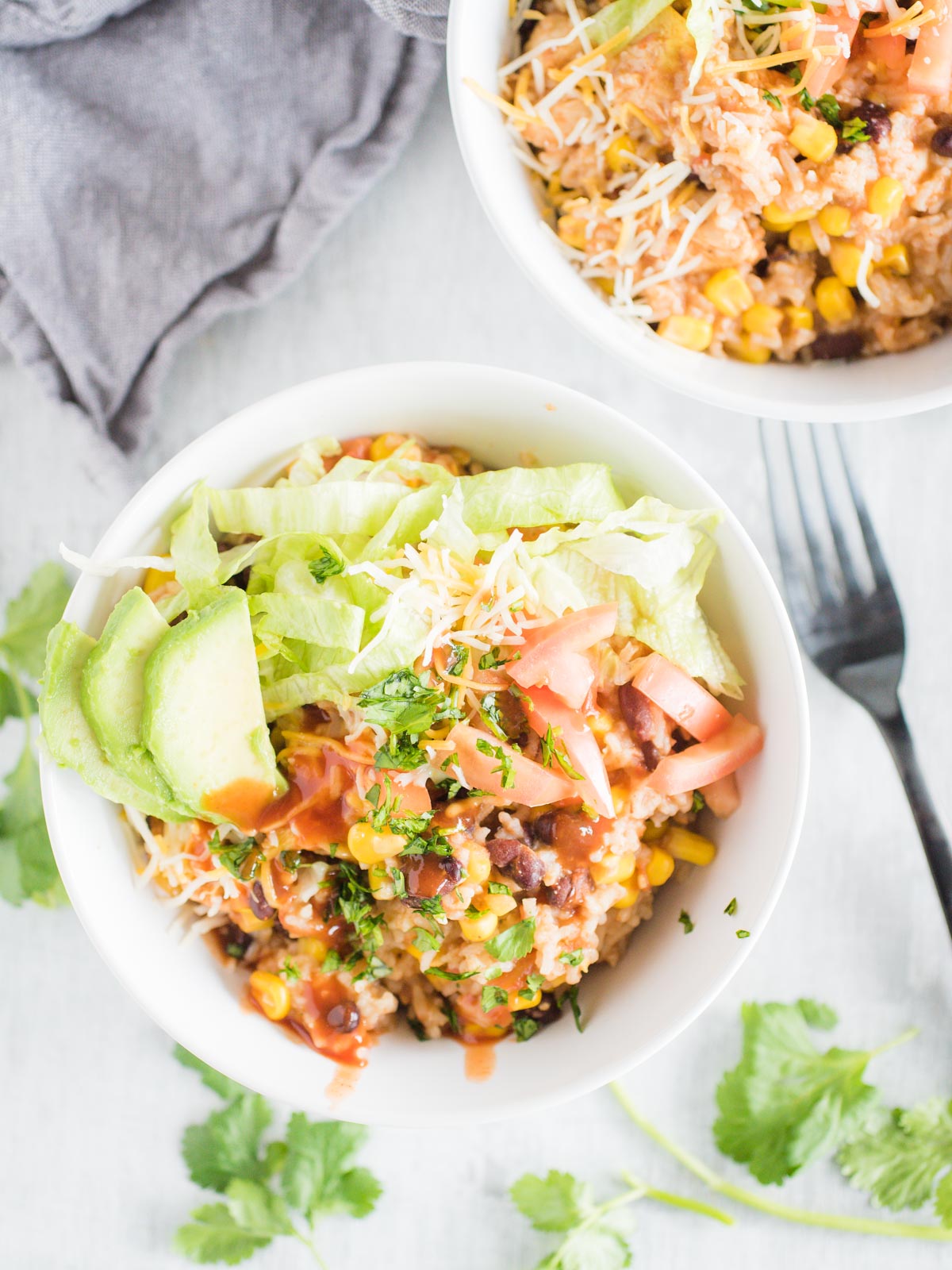 bowl of instant pot chicken burrito bowl with toppings