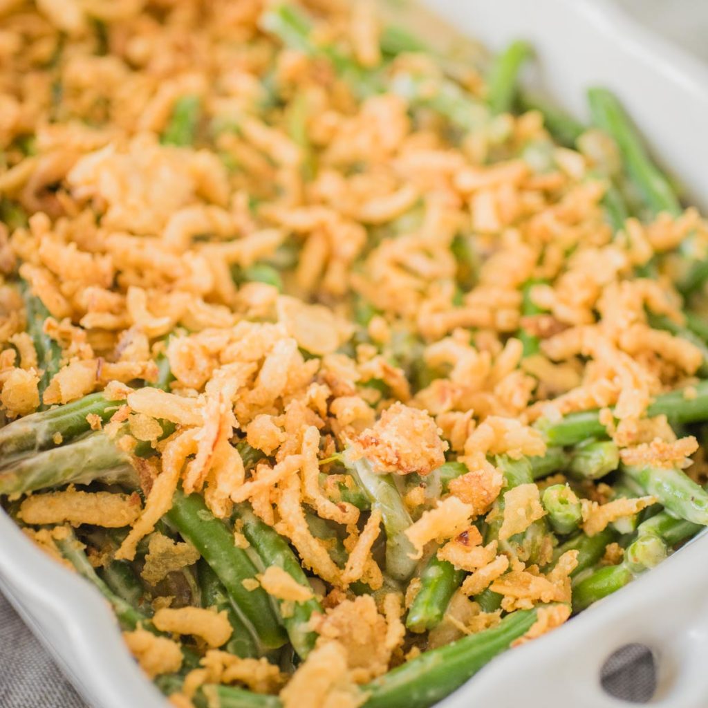 green bean casserole in a white serving dish