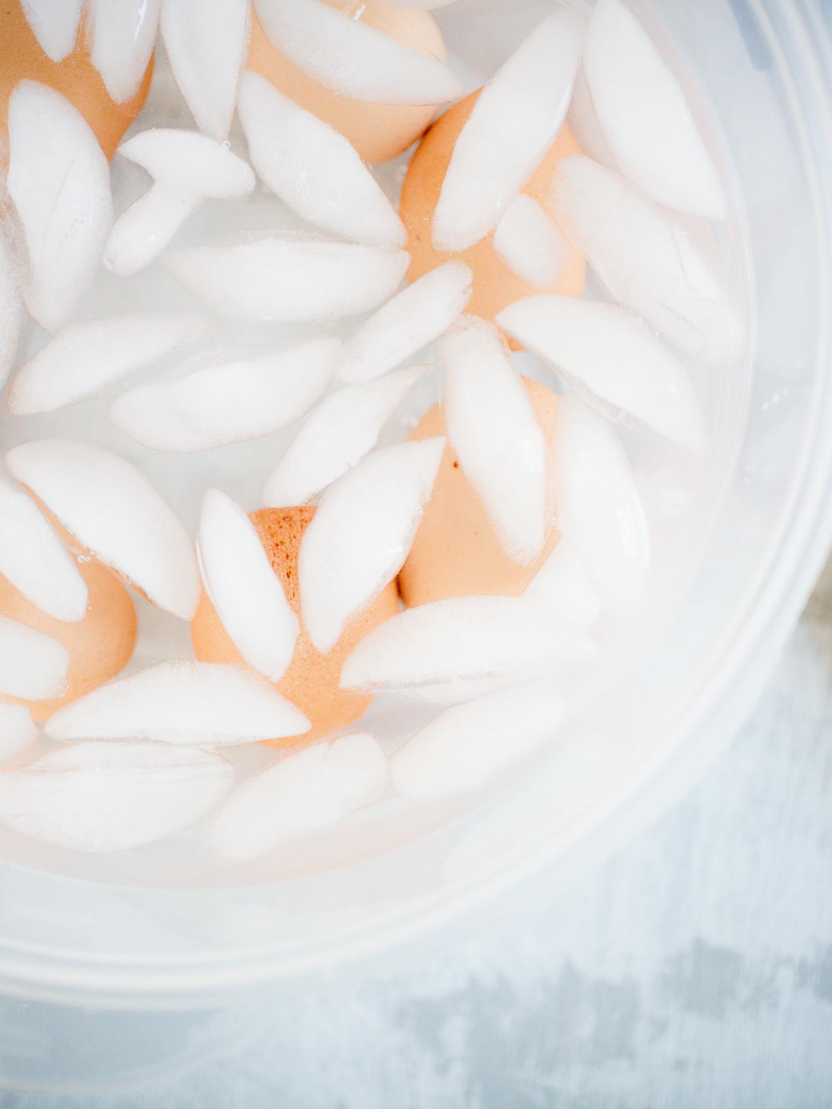 cooked hard boiled eggs in ice bath