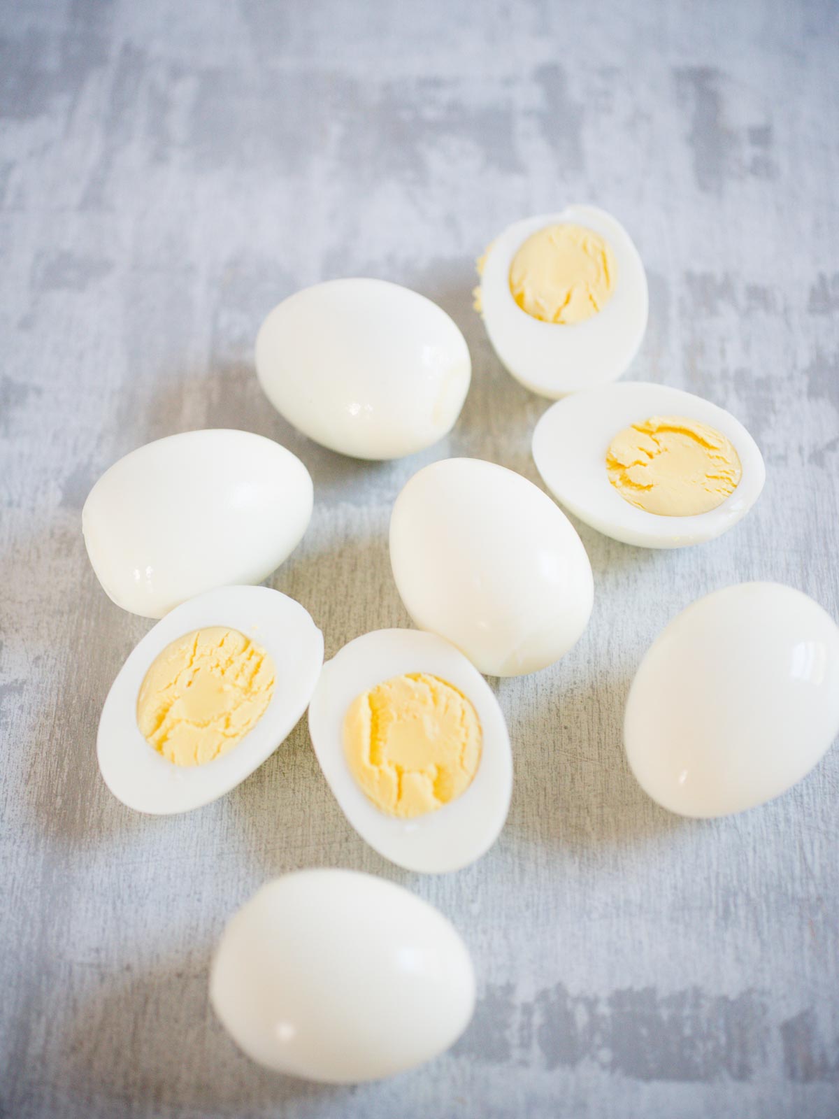 peeled hard boiled eggs with a few sliced