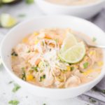 a white bowl full of white chicken chili
