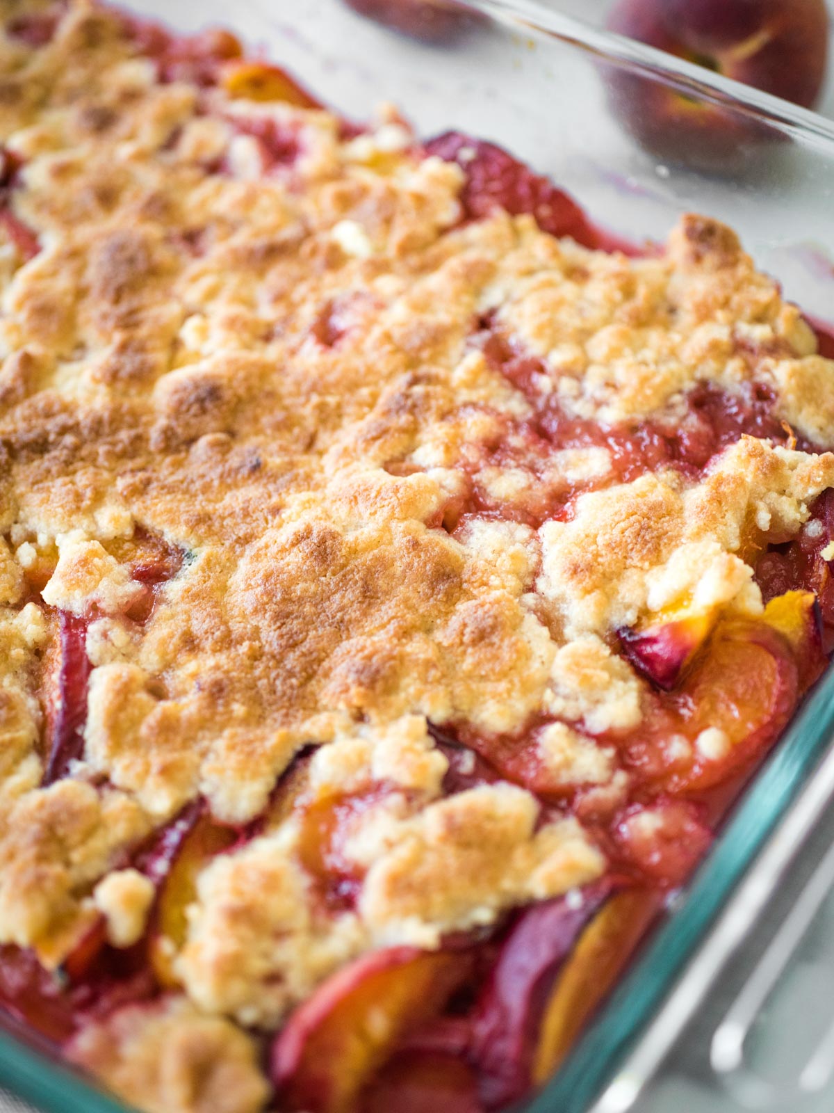 peach cobbler in a baking dish