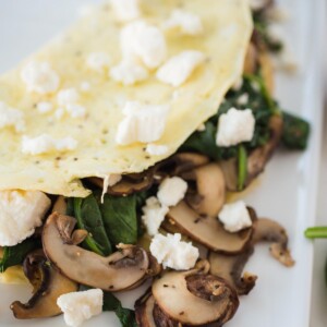 Spinach Mushroom and Feta Omelet on a white plate