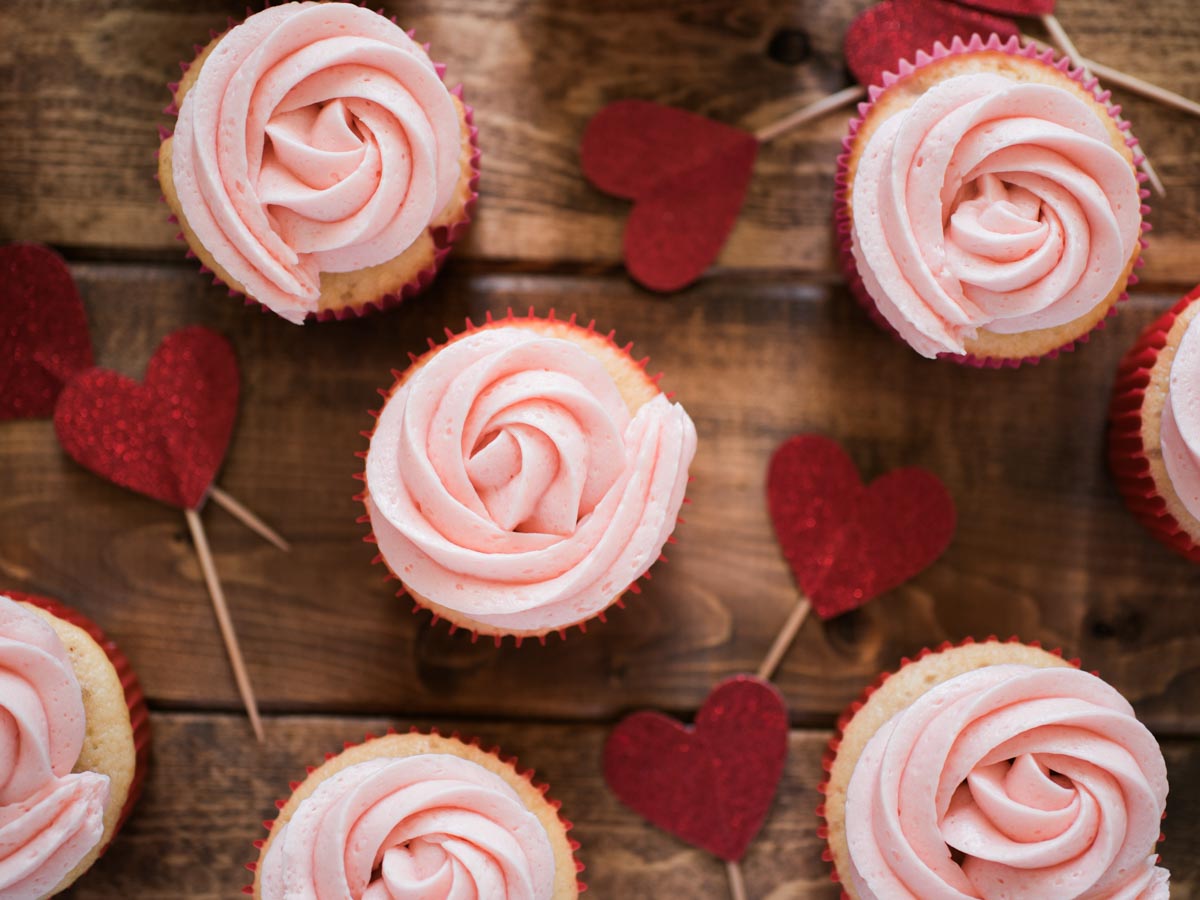 cupcakes with red liners and heart toppers