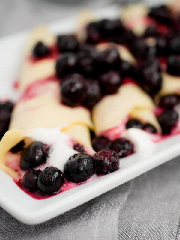 traditional crepes filled with blueberries and whipped cream