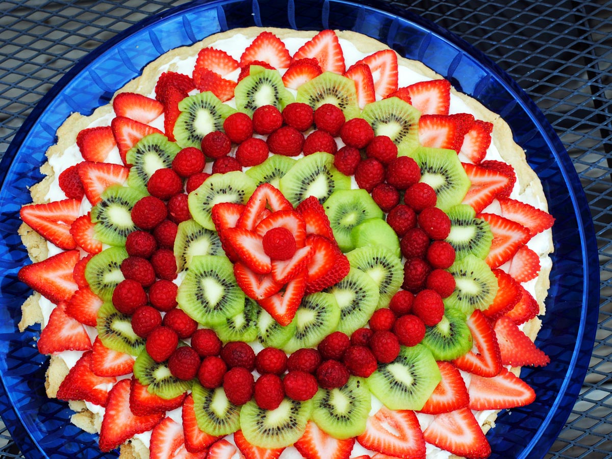 fruit pizza on a blue plate
