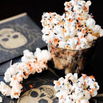 poison popcorn in a cup on a skull napkin