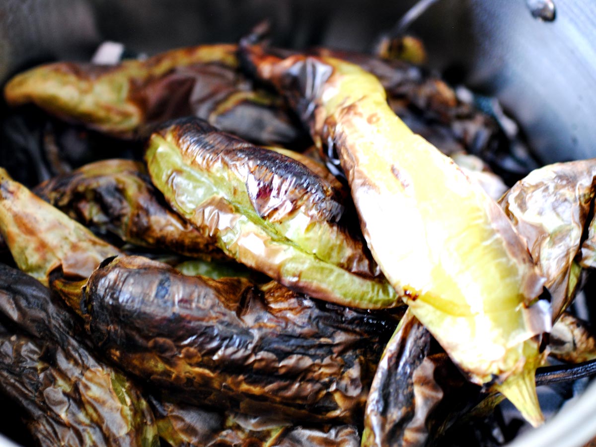 roasted green chiles in a pot