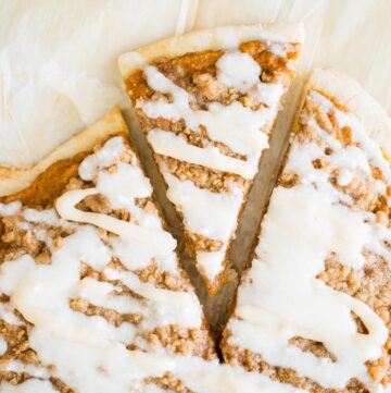 slice of pumpkin dessert pizza cut from a whole pizza