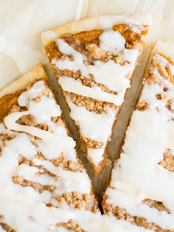 slice of pumpkin dessert pizza cut from a whole pizza