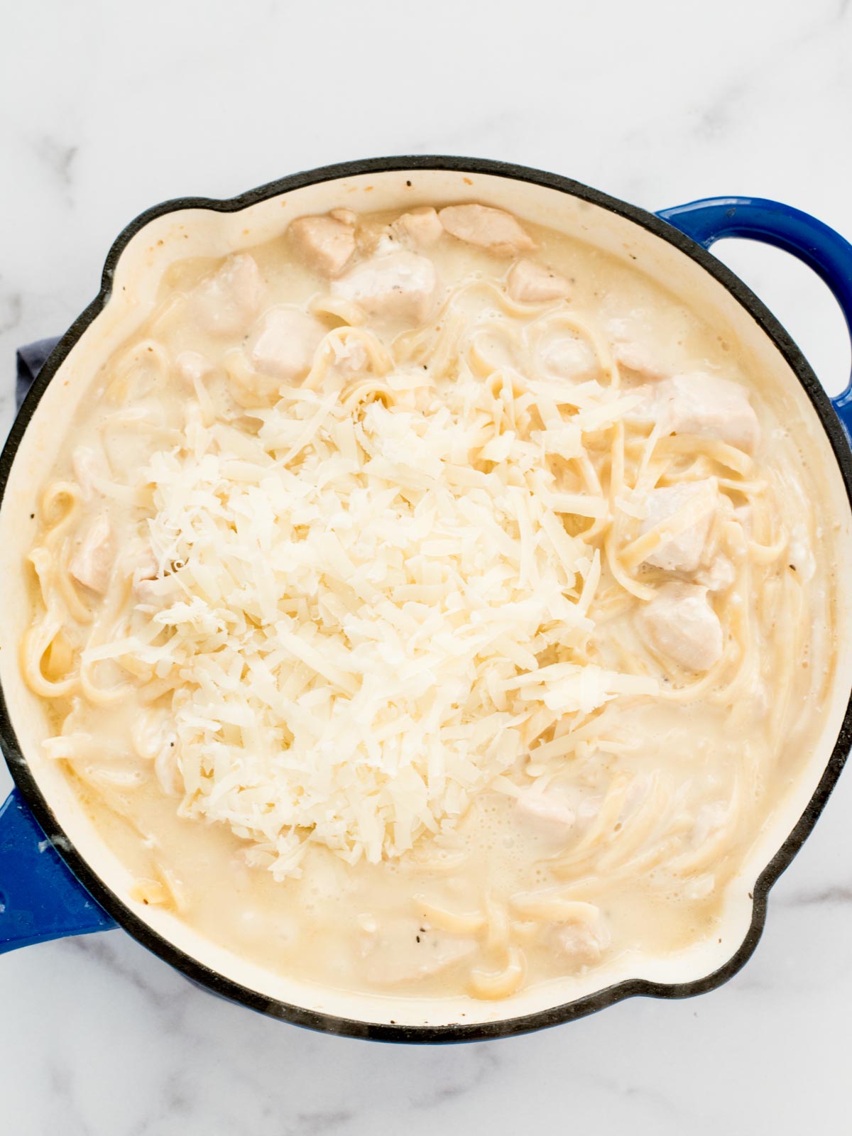 parmesan added to skillet