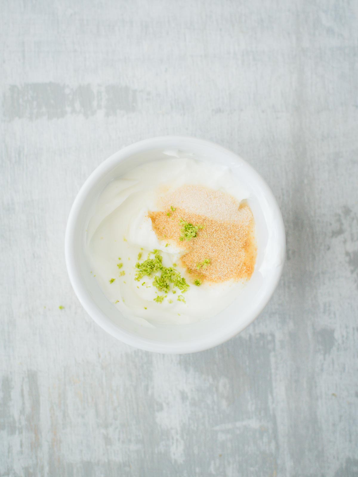 creamy lime sauce ingredients in bowl without lime juice