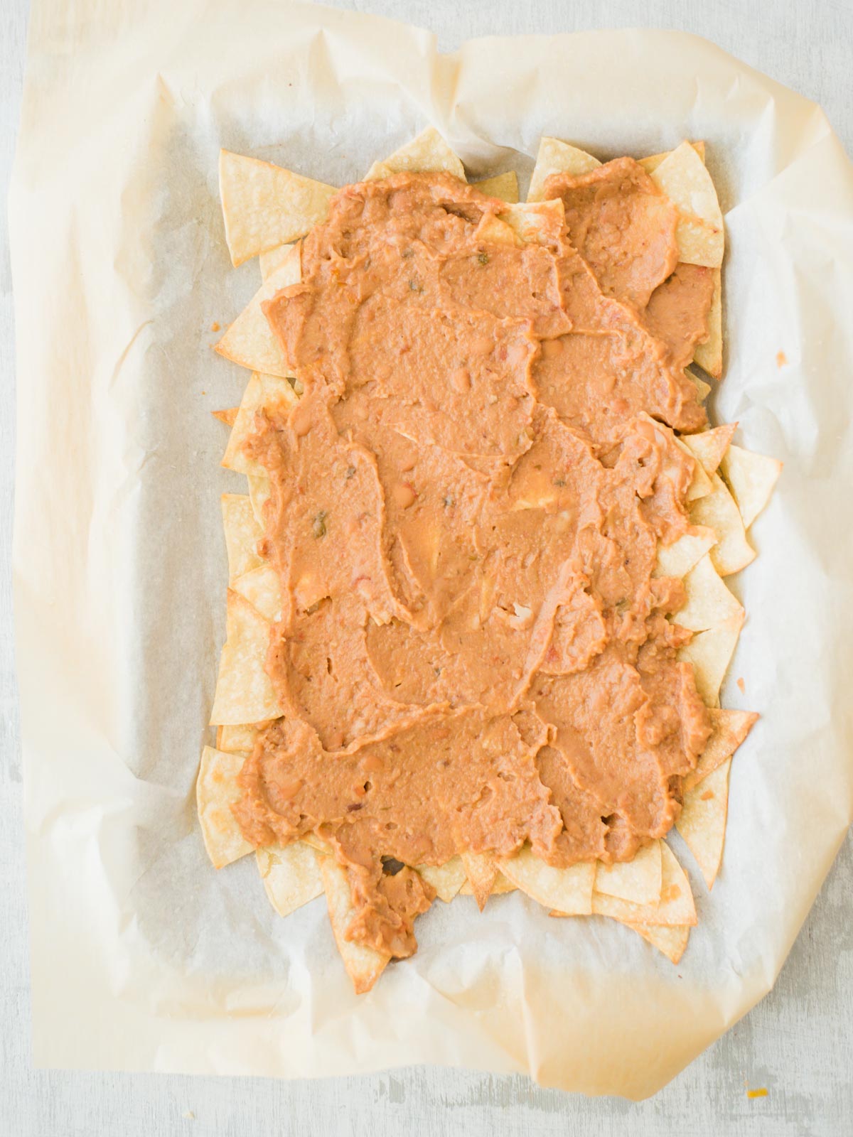 chips and beans layered