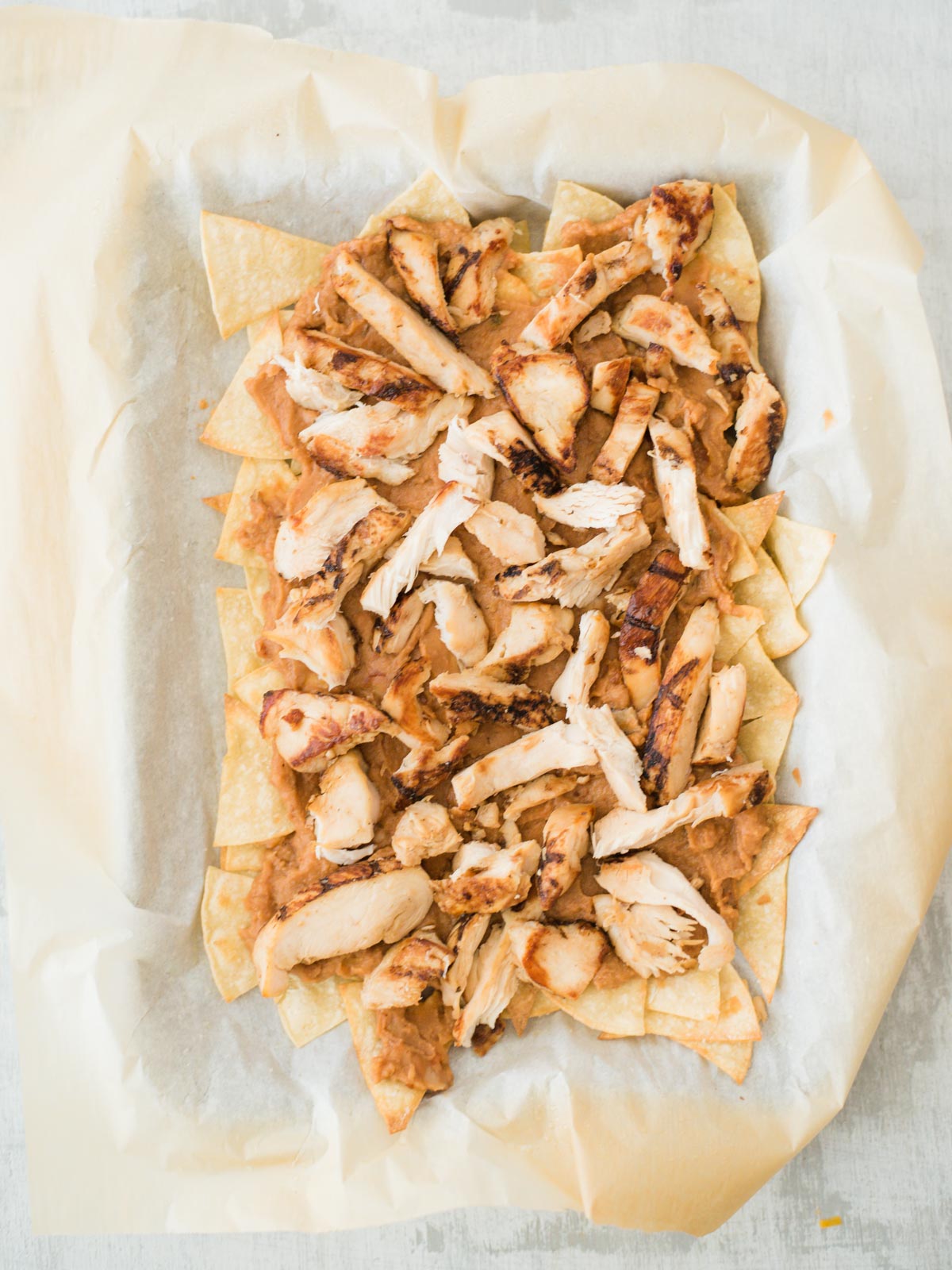 chips beans and chicken layered