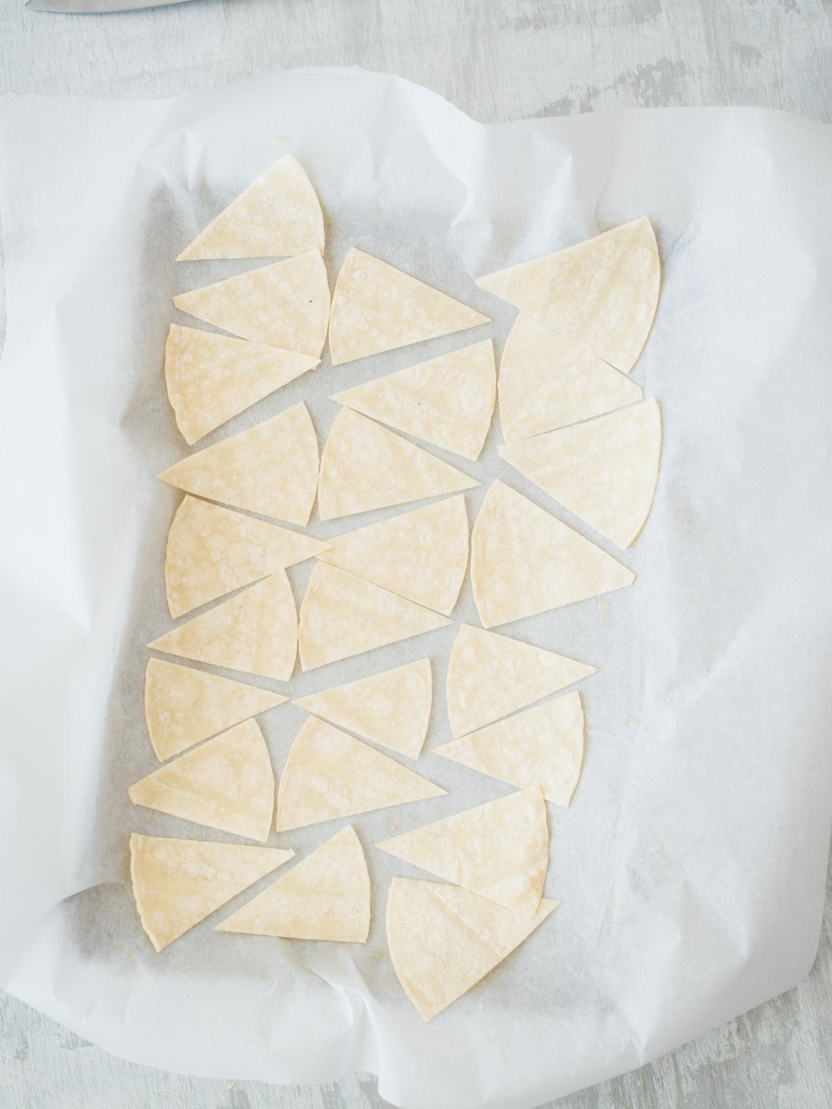 tortillas on baking sheet