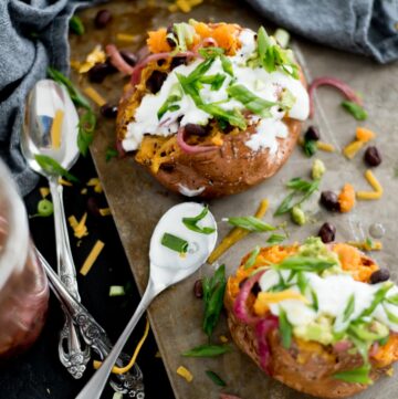 Vegetarian Stuffed Sweet Potatoes on a baking sheet