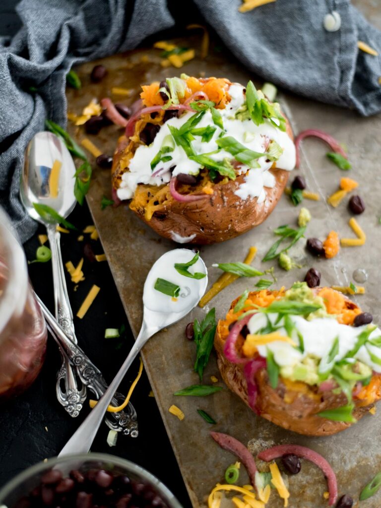 Vegetarian Stuffed Sweet Potatoes on baking sheet