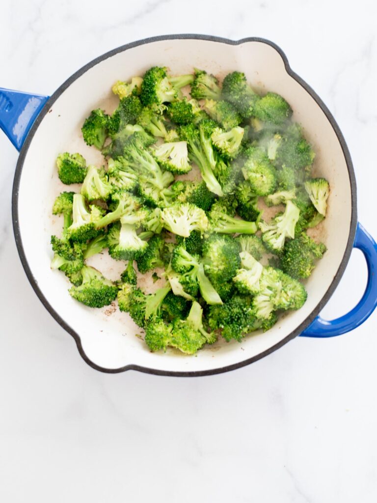 broccoli cooking in a skillet