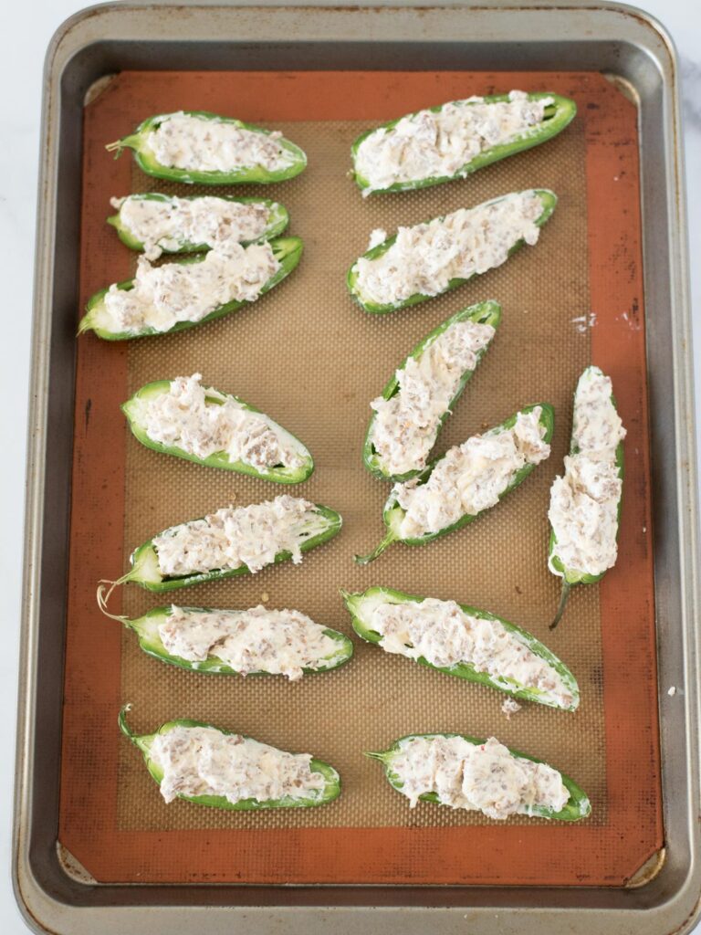 Easy Baked Jalapeno Poppers on a baking sheet