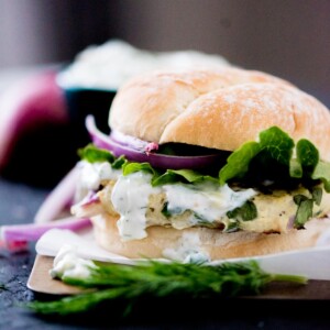 greek turkey burger with tzatziki sauce, red onion, and lettuce