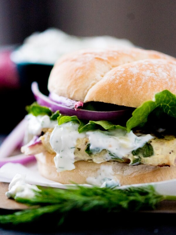 greek turkey burger with tzatziki sauce, red onion, and lettuce