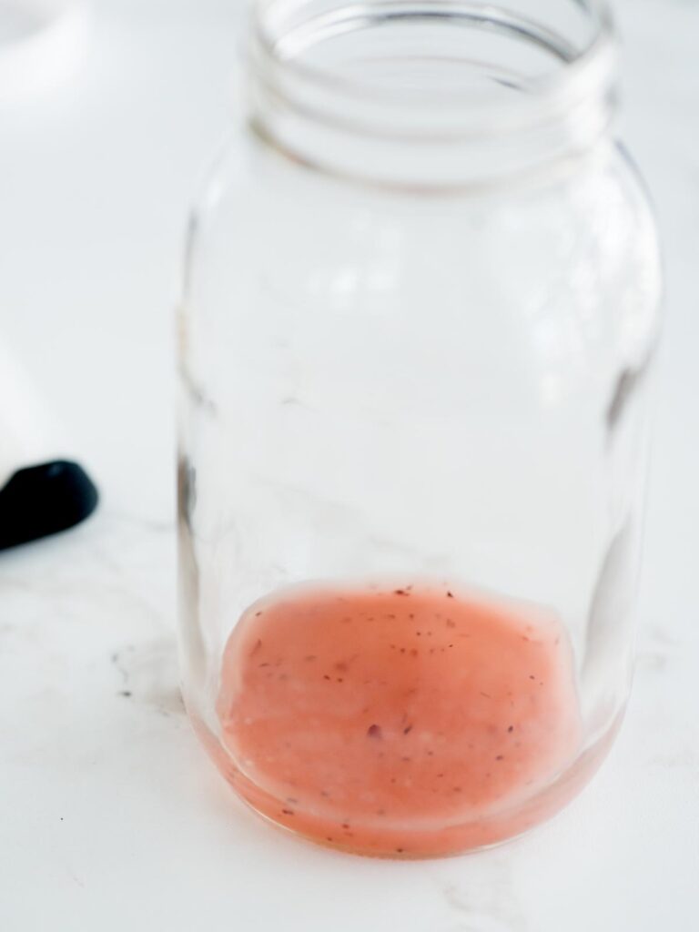 raspberry vinaigrette in a mason jar