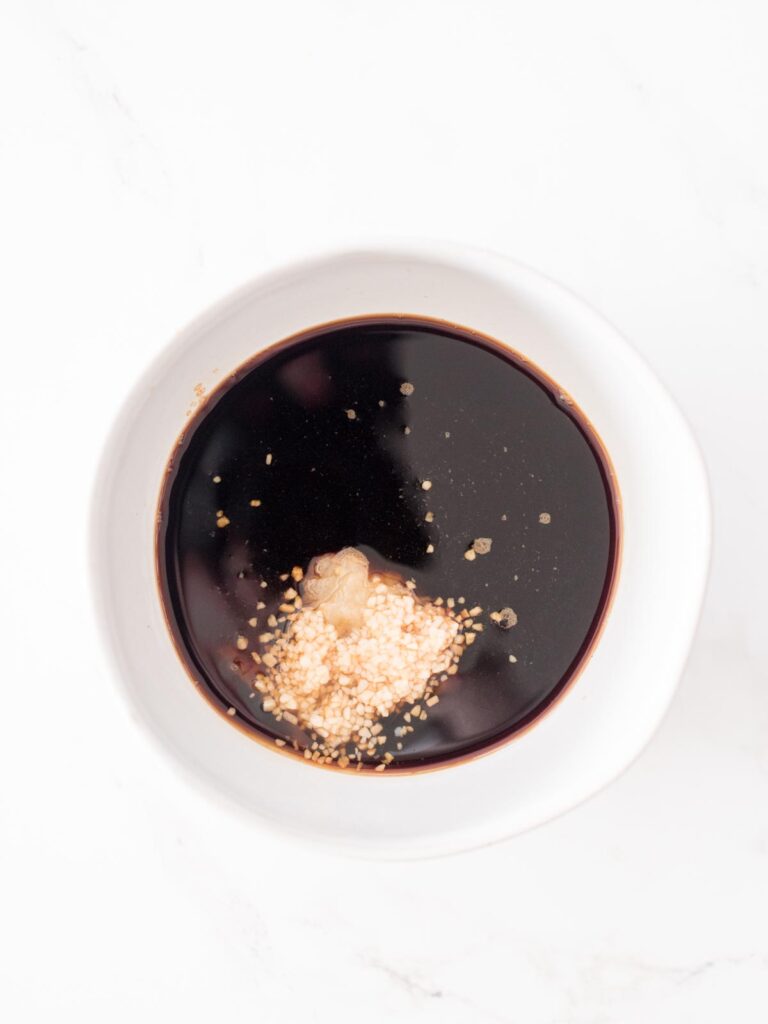 garlic, ginger, soy sauce, and brown sugar in a bowl