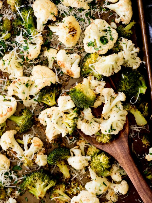 garlic parmesan roasted cauliflower and broccoli on a sheet pan