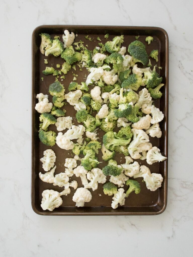 broccoli and cauliflower on a sheet pan