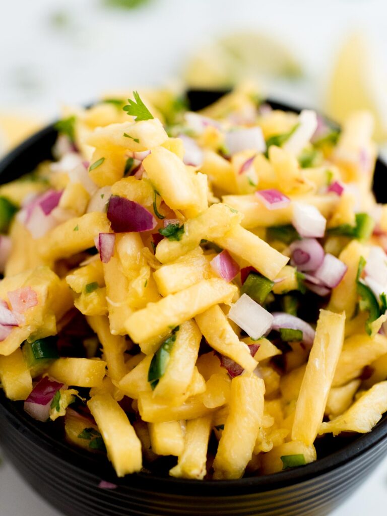 pineapple pico de gallo in a block bowl