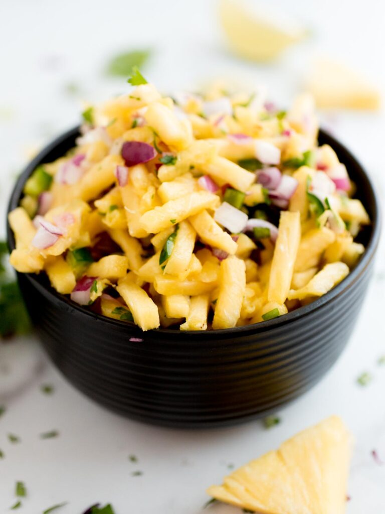 pineapple pico de gallo in a block bowl