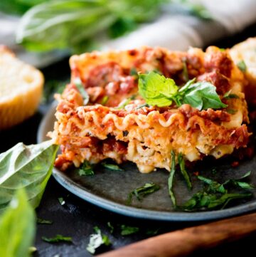 crockpot lasagna topped with fresh basil