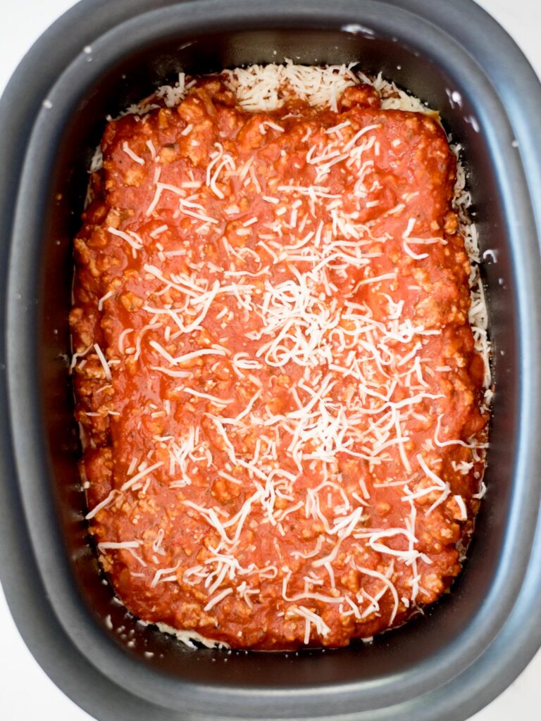 uncooked crockpot lasagna in the slow cooker