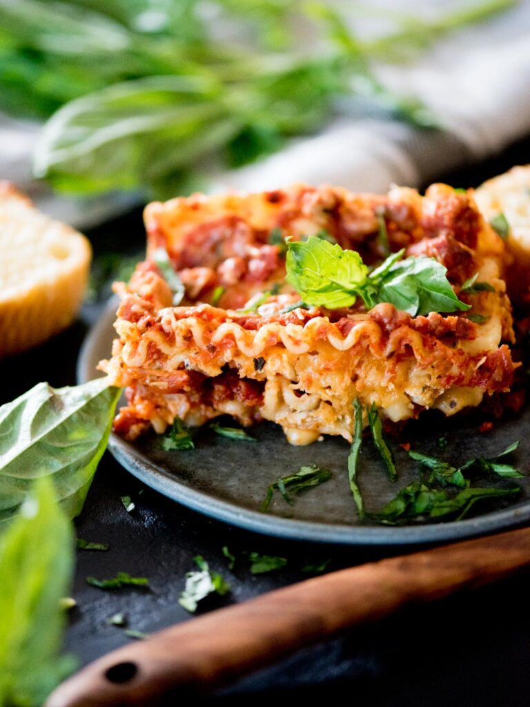 crockpot lasagna topped with fresh basil