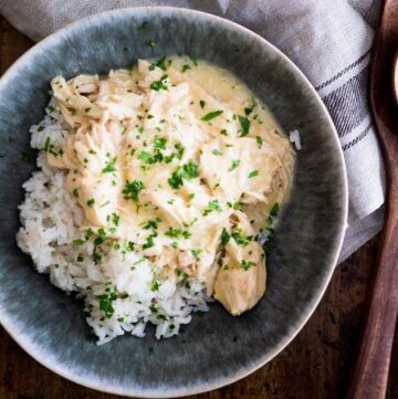 crockpot ranch chicken over rice sprinkled with parsley