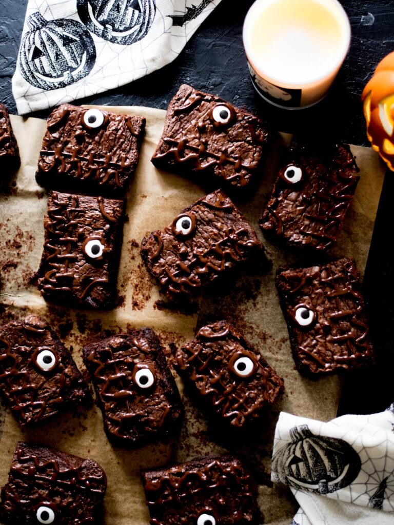 halloween brownies with a candle, towel, and pumpkin