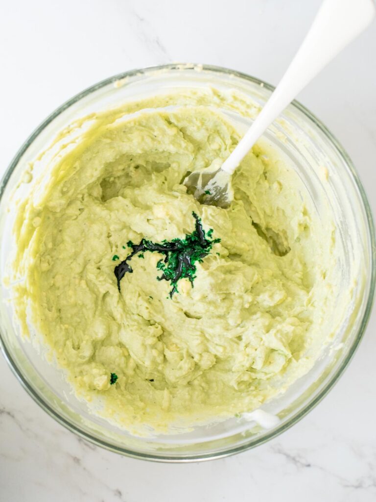 green food coloring added to mixing bowl of filling