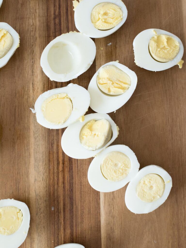 hard boiled eggs on a cutting board