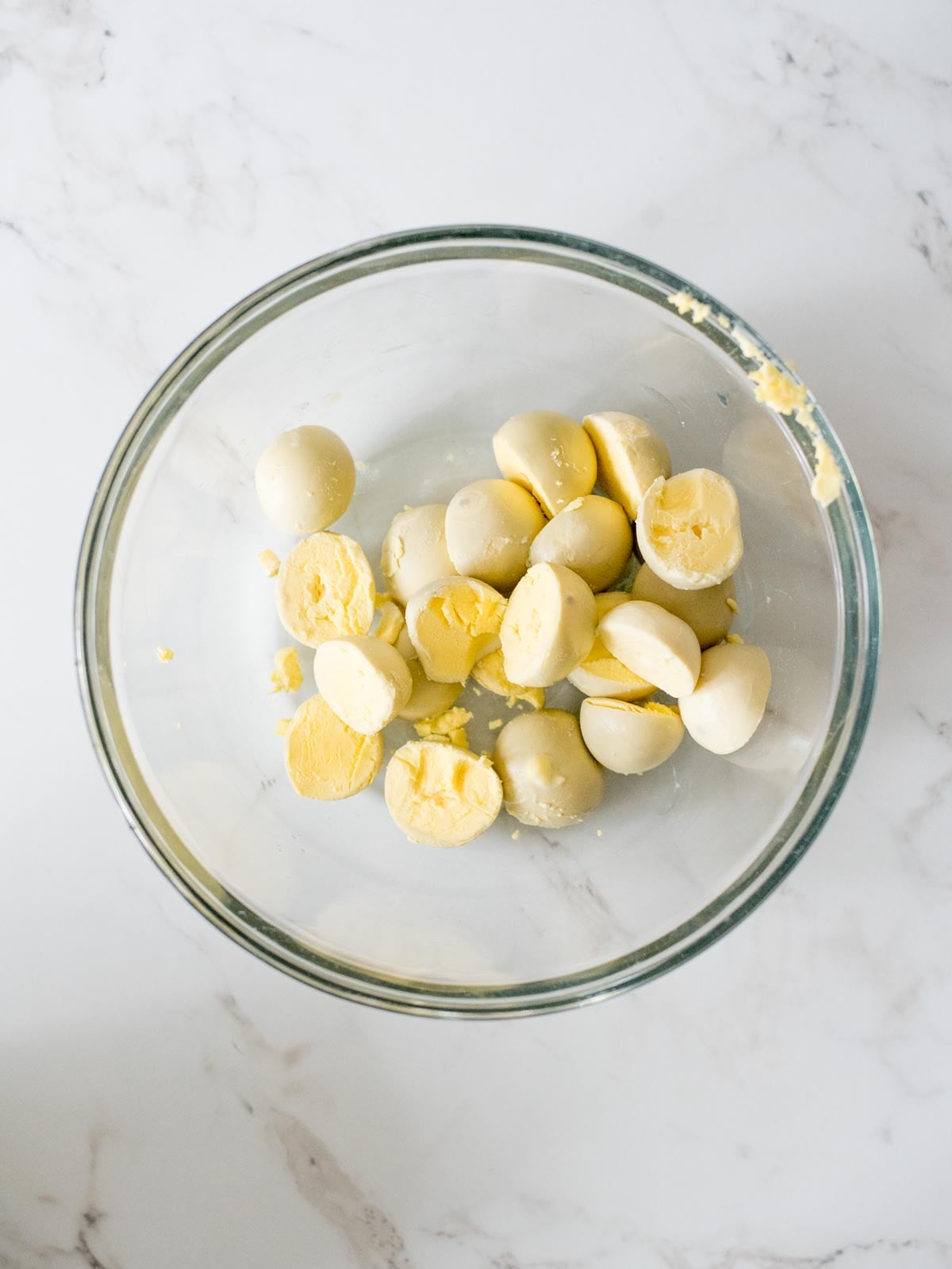 hard boiled egg yolks in a mixing bowl