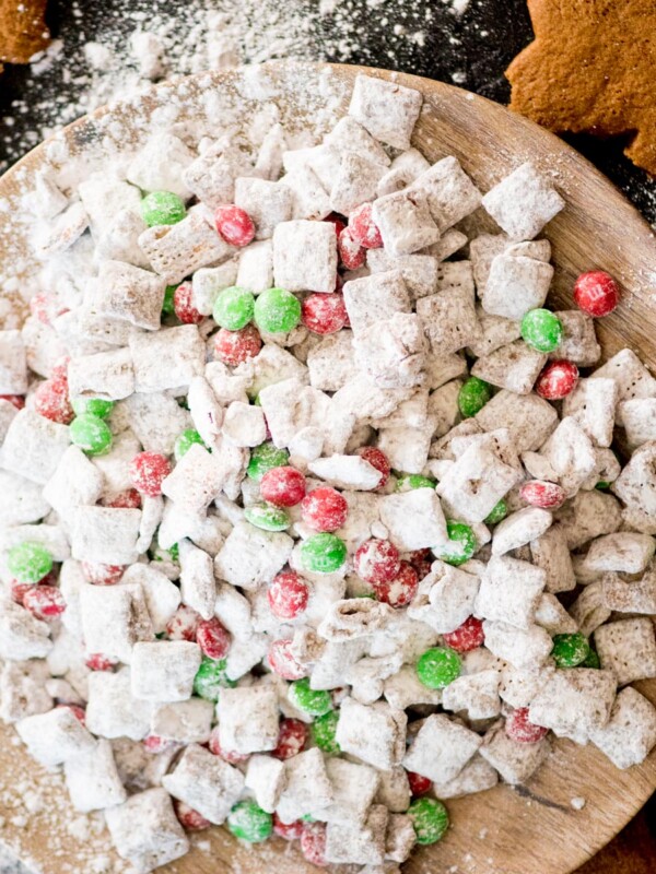 reindeer chow on a plate surrounded by cookies