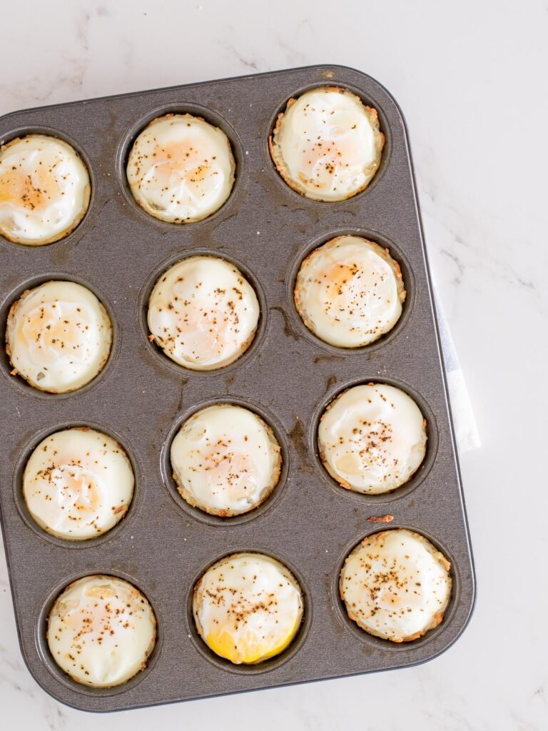 cooked eggs in a basket in a muffin tin